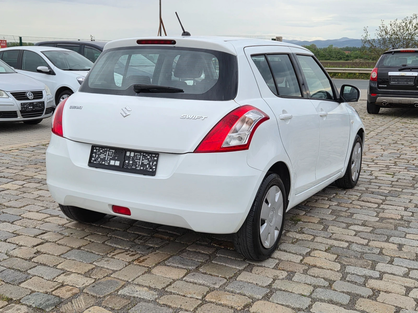 Suzuki Swift 1.2i 90кс EURO 5B 12.2013, снимка 8 - Автомобили и джипове - 54473691