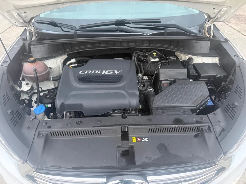 Hyundai Tucson 2.0 CRDI 4x4, снимка 17 - Автомобили и джипове - 52307740