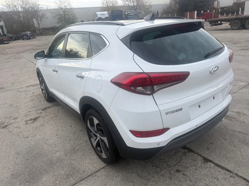 Hyundai Tucson 2.0 CRDI 4x4, снимка 6 - Автомобили и джипове - 52307740
