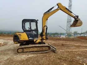      Caterpillar 304.5