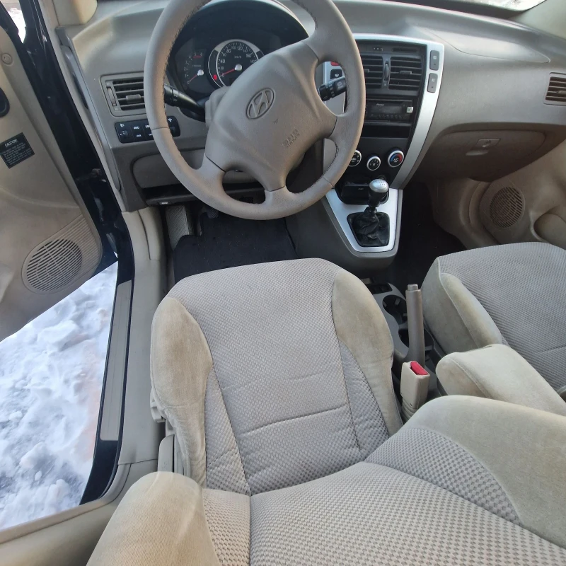 Hyundai Tucson 2.0, снимка 7 - Автомобили и джипове - 48708264