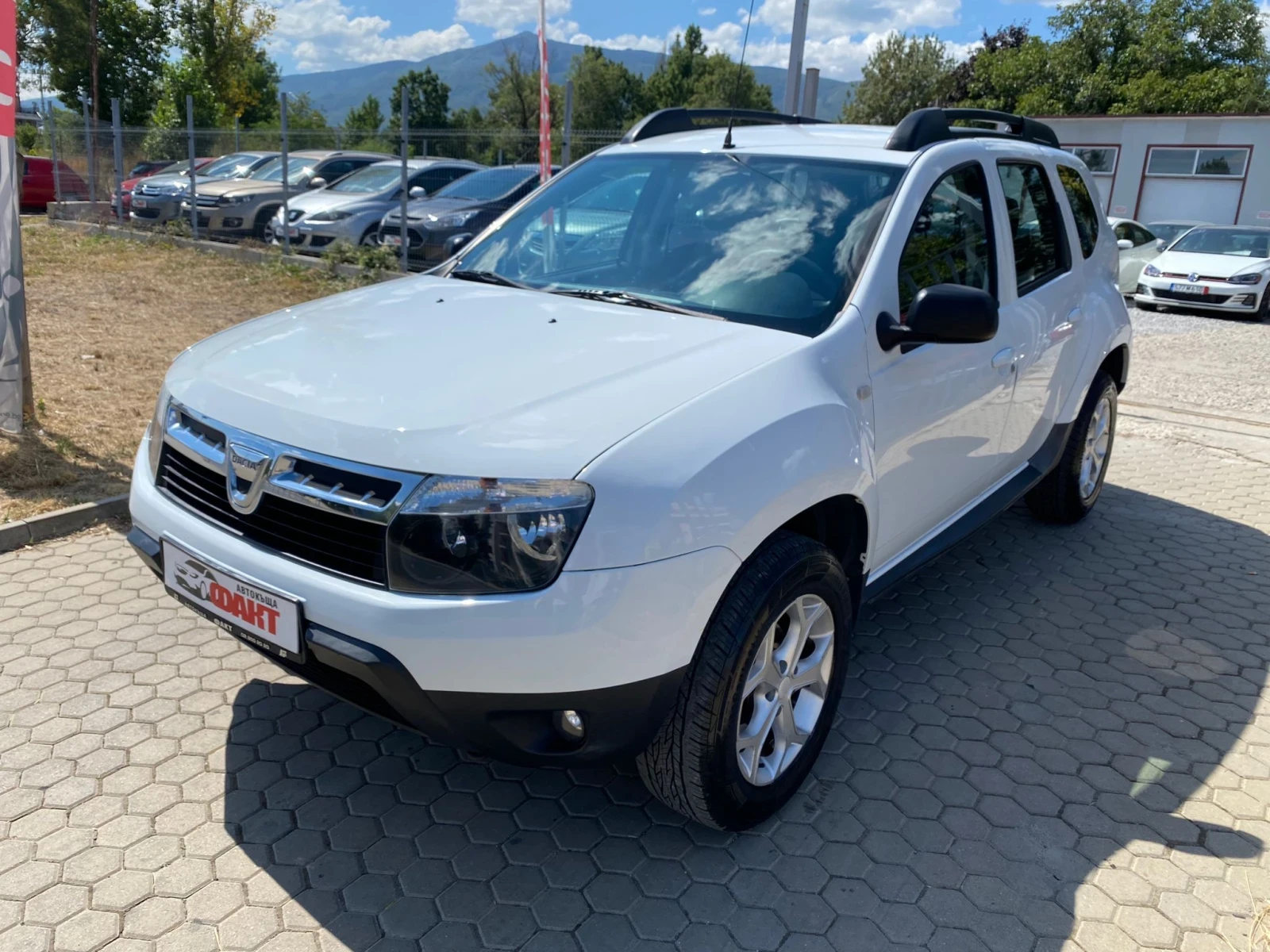 Dacia Duster 1.6i/4x4 - [1] 