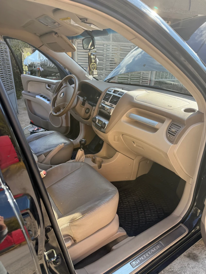 Kia Sportage, снимка 12 - Автомобили и джипове - 52155380