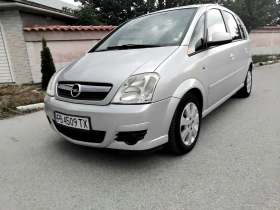 Opel Meriva 1.4i.75k + КЛИМА + ГАЗОВ ИНЖЕКЦИОН 2007г , снимка 14