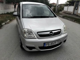 Opel Meriva 1.4i.75k + КЛИМА + ГАЗОВ ИНЖЕКЦИОН 2007г , снимка 16