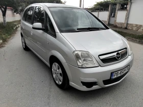 Opel Meriva 1.4i.75k + КЛИМА + ГАЗОВ ИНЖЕКЦИОН 2007г , снимка 15