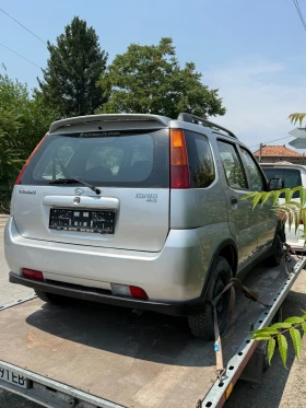 Suzuki Ignis 1.3i 4x4 - 5200 лв. - 74700169 4