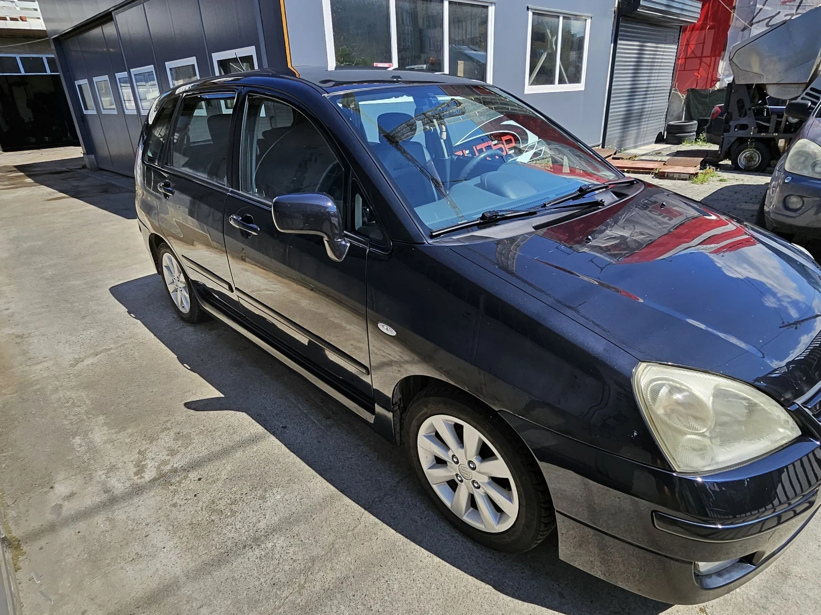 Suzuki Liana 1.6 - изображение 2