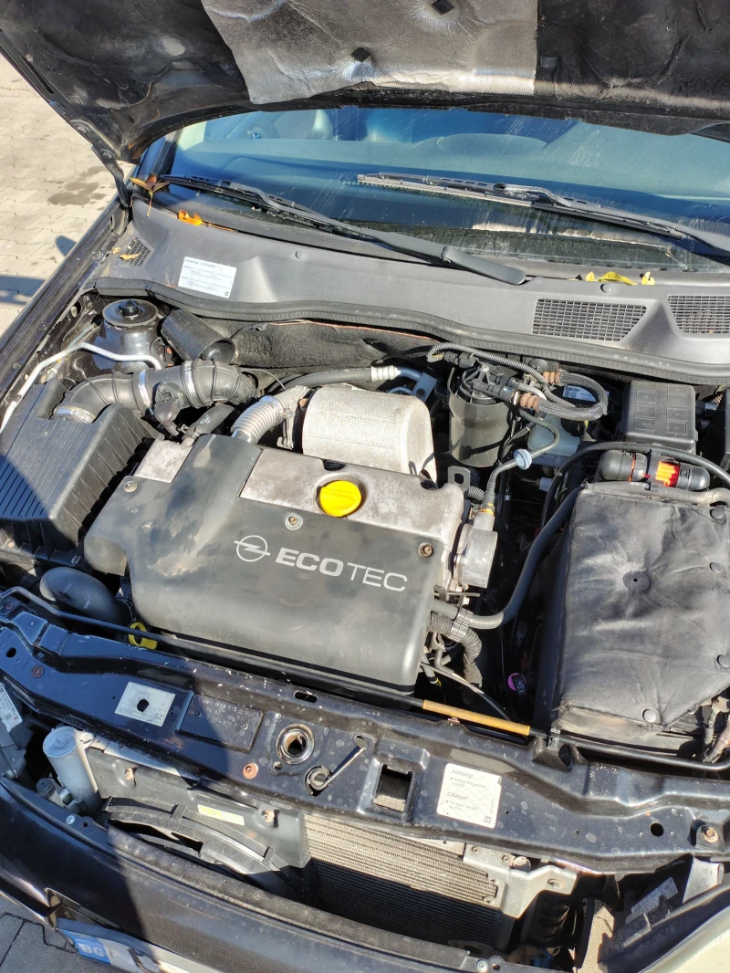 Opel Astra 2.0 автоматик, снимка 12 - Автомобили и джипове - 52254221