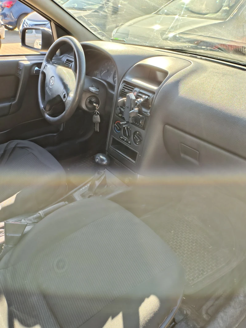 Opel Astra 2.0 автоматик, снимка 9 - Автомобили и джипове - 52254221