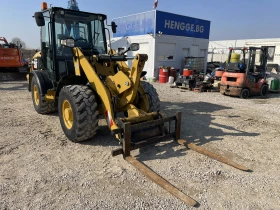 Челен товарач Caterpillar 906H, снимка 11