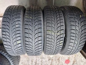 Гуми Зимни 205/70R15, снимка 1 - Гуми и джанти - 38496328