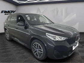 ������ BMW iX1