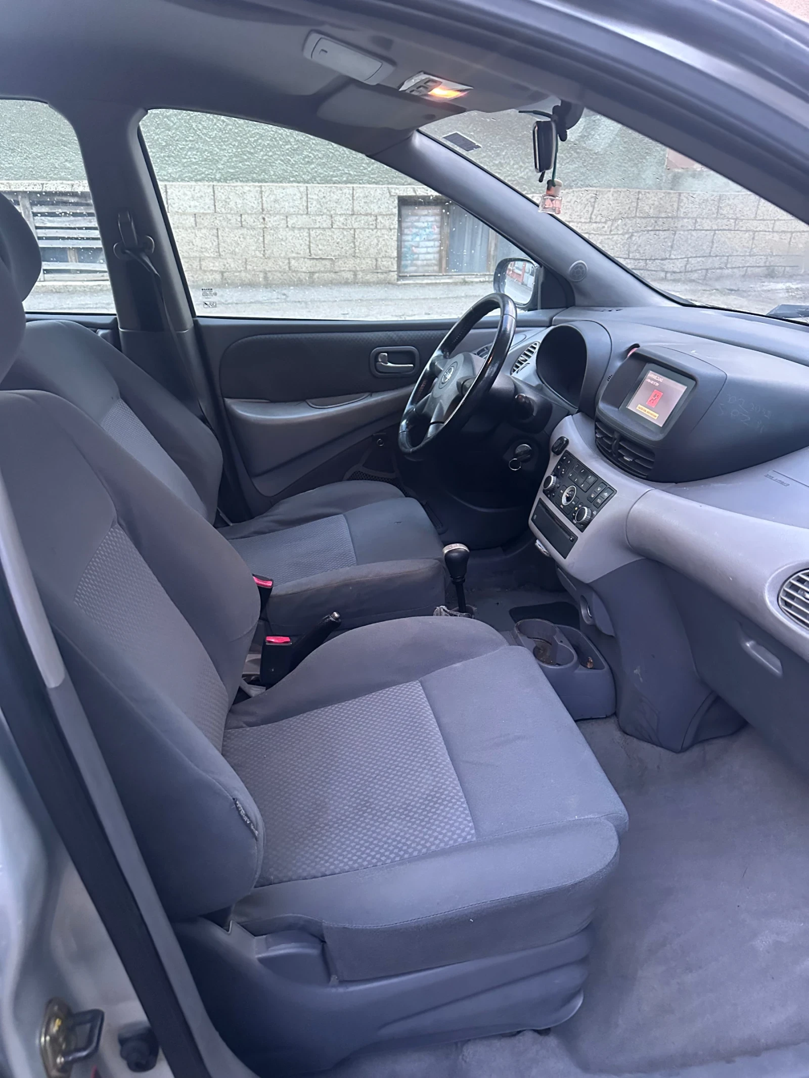 Nissan Almera tino  - изображение 4