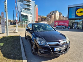 Opel Astra 1.9 CDTI, снимка 1