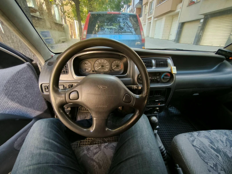 Daihatsu Sirion M1, снимка 8 - Автомобили и джипове - 47487629