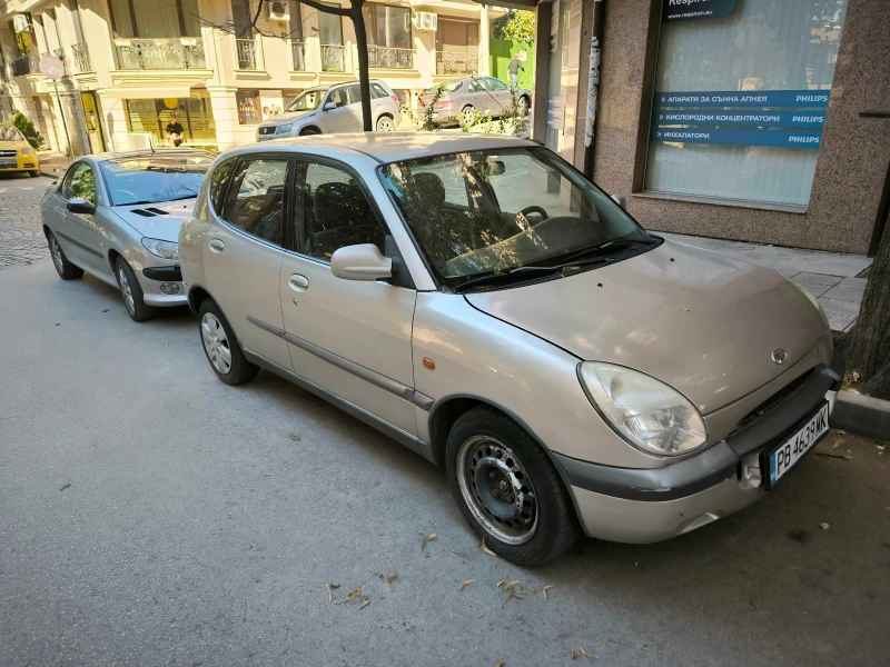 Daihatsu Sirion M1, снимка 4 - Автомобили и джипове - 47487629