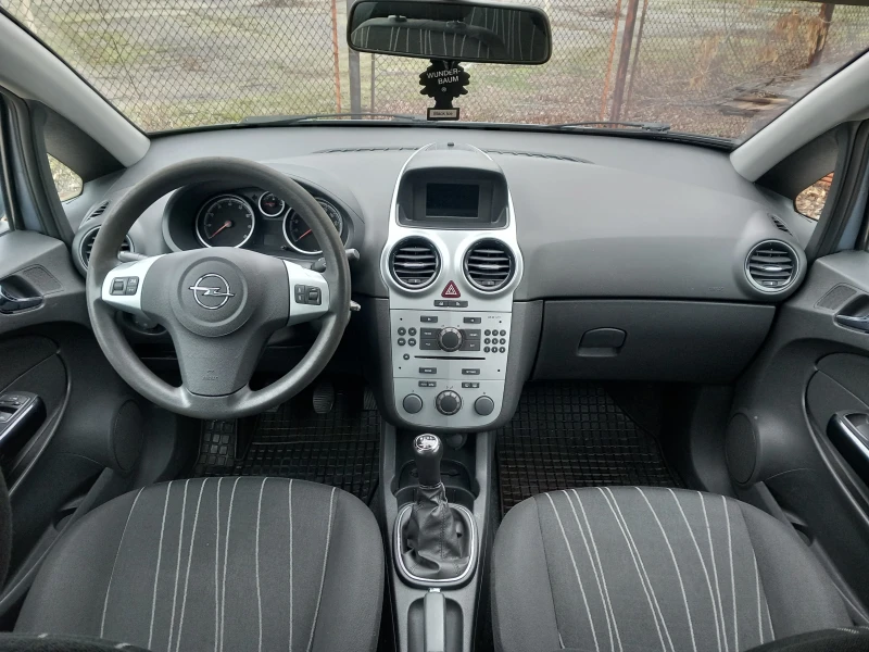 Opel Corsa 1.2 климатроник, снимка 9 - Автомобили и джипове - 48481728