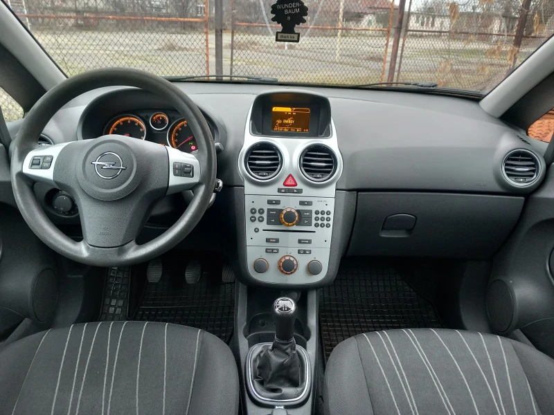 Opel Corsa 1.2 климатроник, снимка 16 - Автомобили и джипове - 48481728