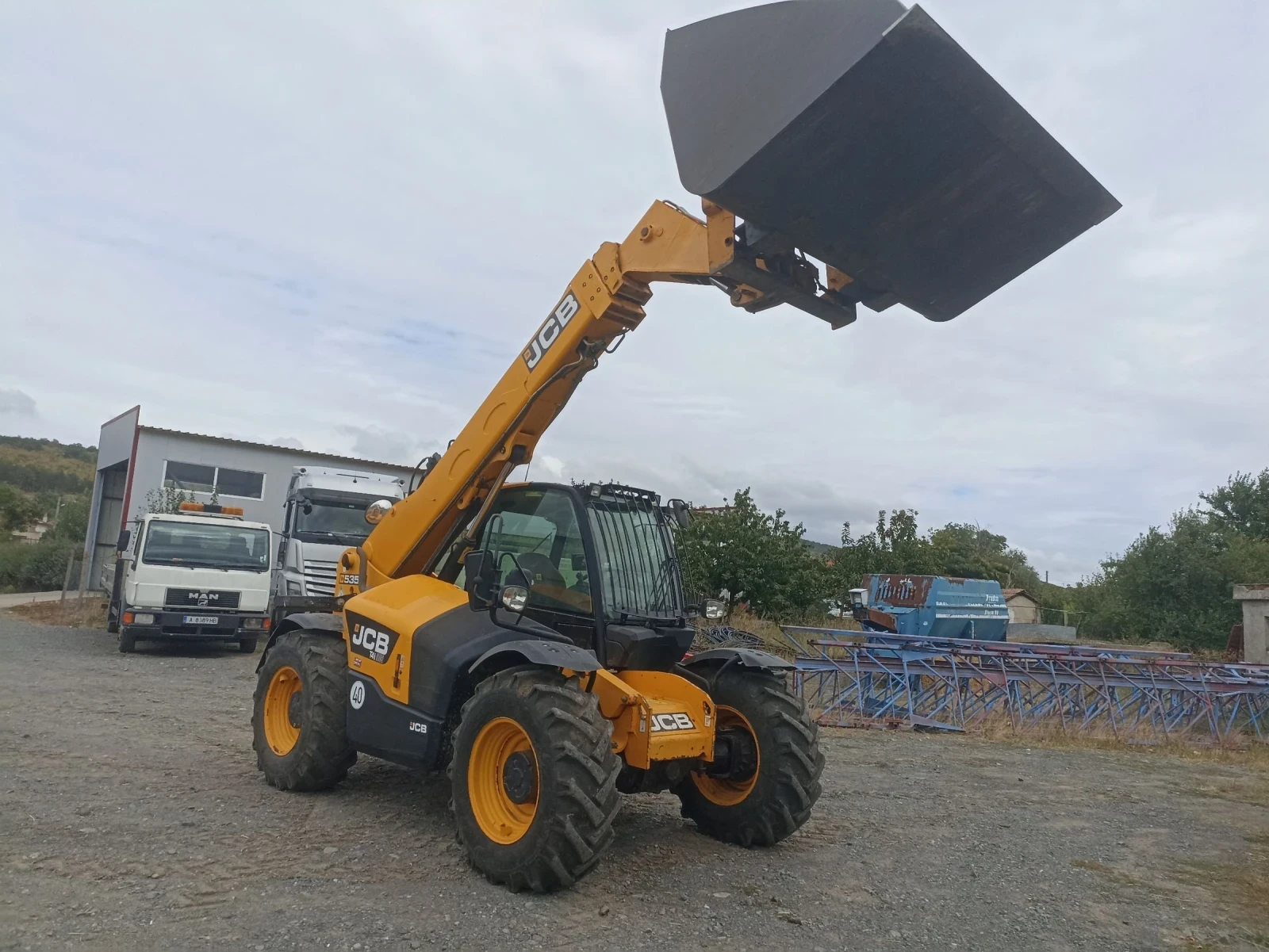 Телескопичен товарач JCB 535-95, снимка 1