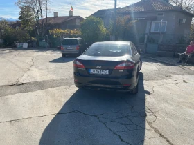 Ford Mondeo  Mk4 2.0 TDCi 140коня. , Ghia, 2007 - 6000 лв. / 3067.75 € - 97998302 4