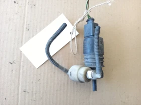 Помпа чистачки Фолксваген Пасат Б6 (к)