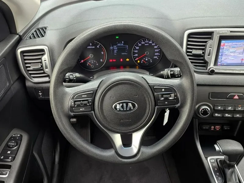 Kia Sportage 2.0 CRDi 4WD, снимка 14 - Автомобили и джипове - 54275014
