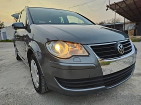 VW Touran 2.0TDI 140к.с 7-местен + зимни гуми - 3500 € / 6845.40 лв. - 35869525 4