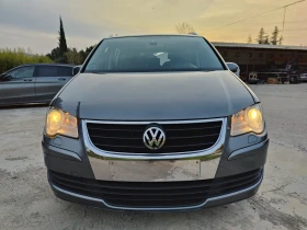 VW Touran 2.0TDI 140к.с 7-местен + зимни гуми - 3500 € / 6845.40 лв. - 35869525 3