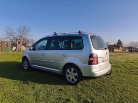 VW Touran 2.0 140 - 2000 € / 3911.66 лв. - 17922233 2