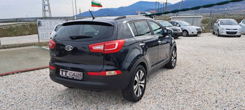 Kia Sportage 2.0 CRDI 4X4 АВТОМАТ, КОЖА, НАВИ, ПОДГРЕВ, снимка 7 - Автомобили и джипове - 53479143