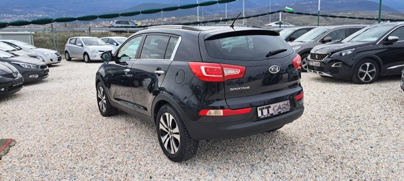 Kia Sportage 2.0 CRDI 4X4 АВТОМАТ, КОЖА, НАВИ, ПОДГРЕВ, снимка 5 - Автомобили и джипове - 53479143