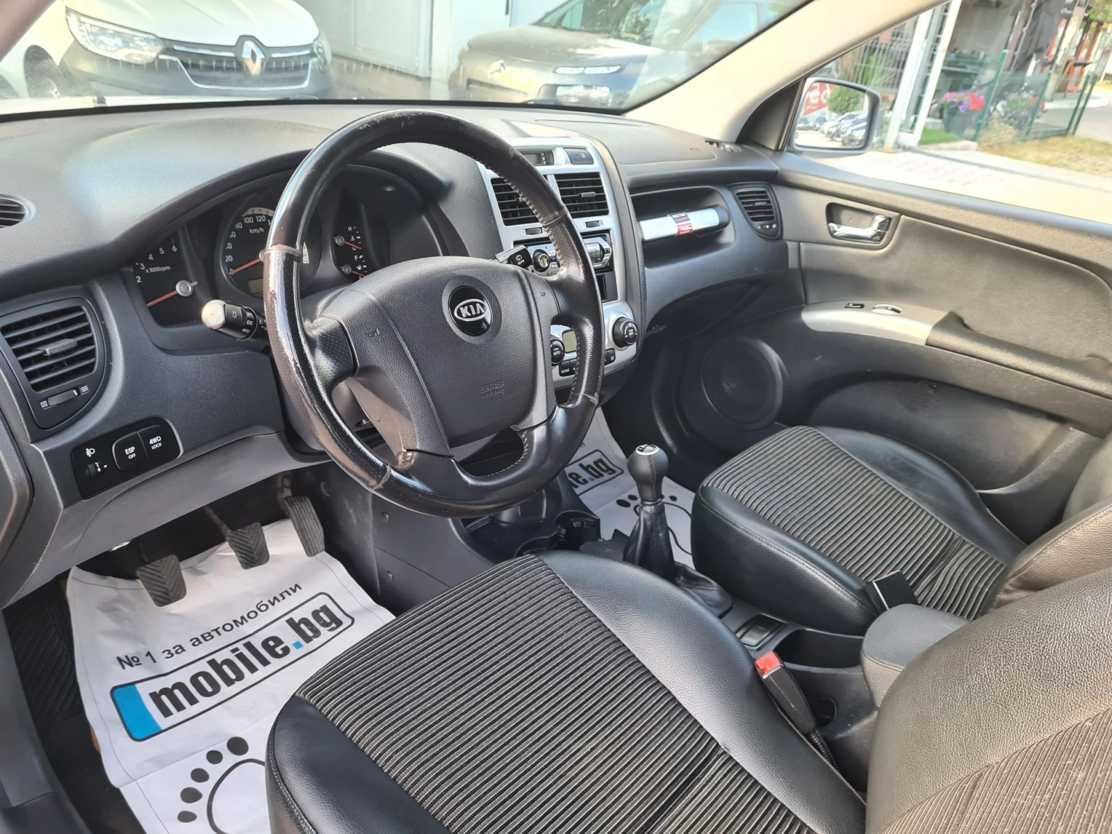 Kia Sportage 2.0CRDI 108p.s  4x4, снимка 9 - Автомобили и джипове - 55609641