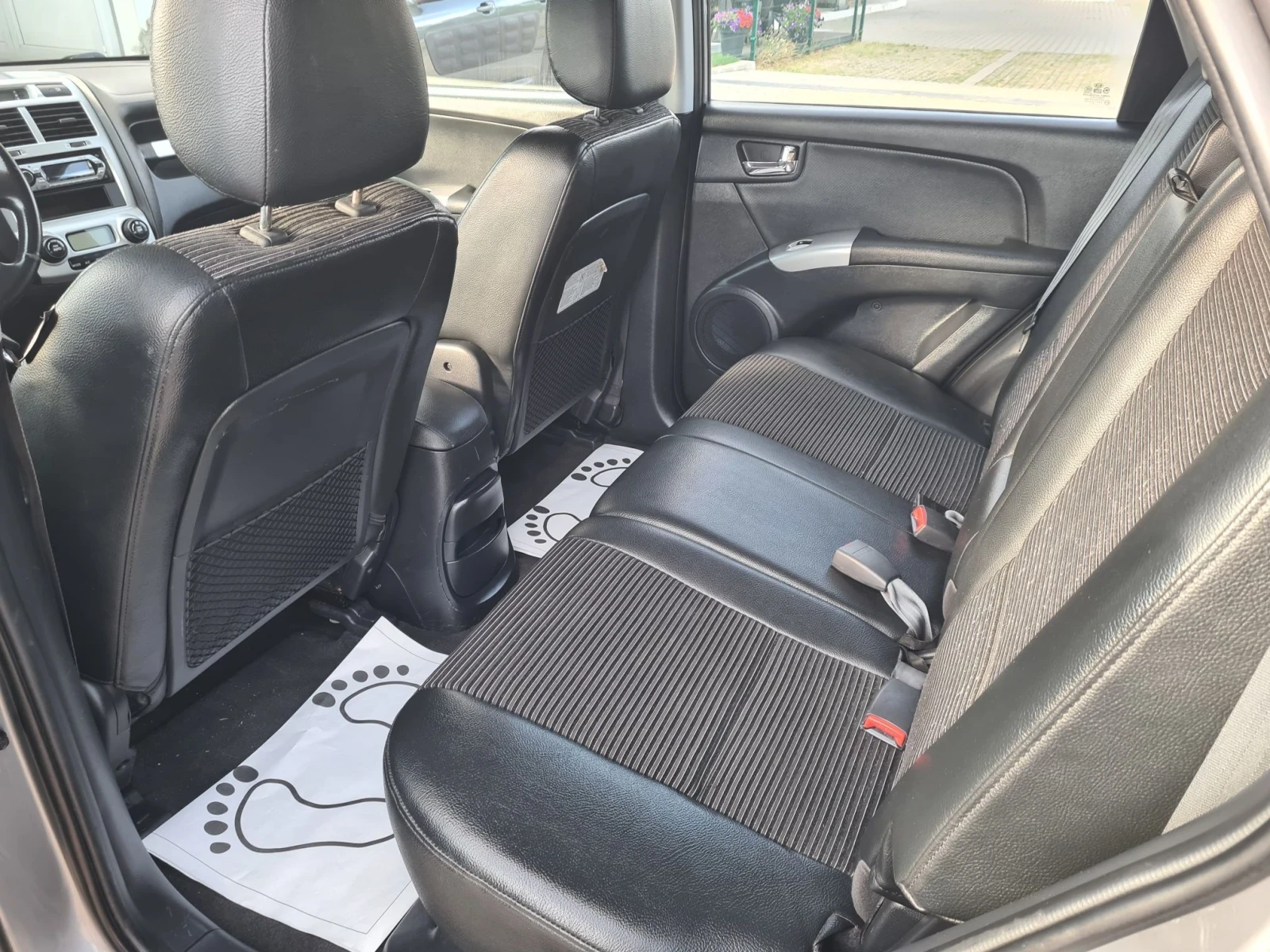 Kia Sportage 2.0CRDI 108p.s  4x4, снимка 11 - Автомобили и джипове - 55609641