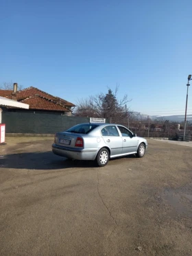 Skoda Octavia 1.6, i, снимка 1