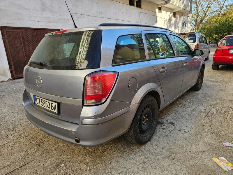 Opel Astra Комби, снимка 3 - Автомобили и джипове - 47672937