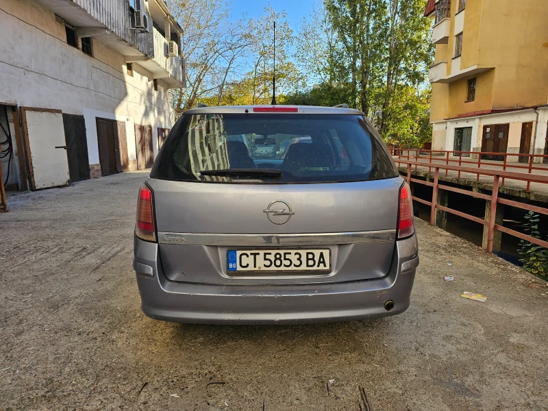 Opel Astra Комби, снимка 4 - Автомобили и джипове - 47672937