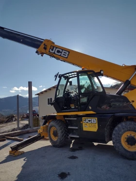 Телескопични товарачи JCB 555-210R, снимка 1