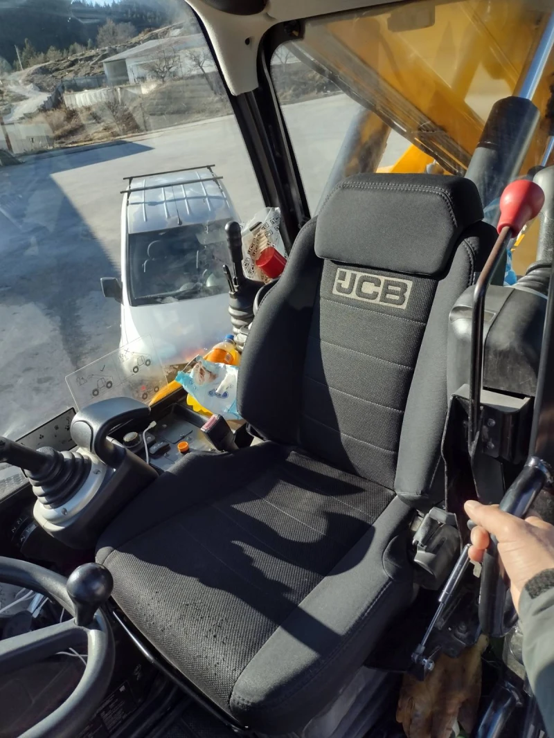 Телескопични товарачи JCB 555-210R, снимка 11 - Индустриална техника - 48320636