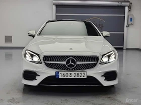 ������ Mercedes-Benz E 220