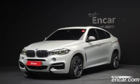 BMW X6 M50d, снимка 1