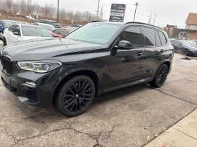 BMW X5 M50i | DISTRONIC| LASERLIGHT| SWAROWSKI| CARFAX - 28700 € / 56132.32 лв. - 85220212 2