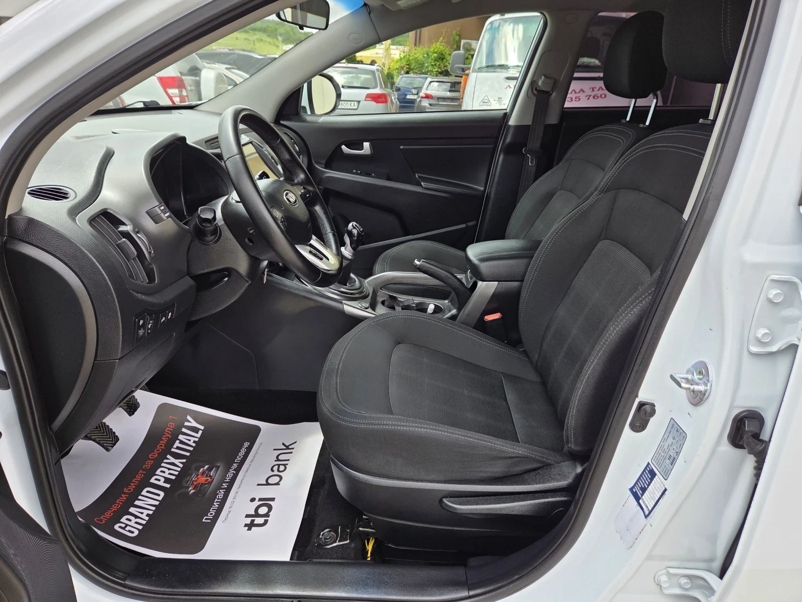 Kia Sportage 1.6i БЕНЗИН/ ГАЗ, снимка 11 - Автомобили и джипове - 54882281