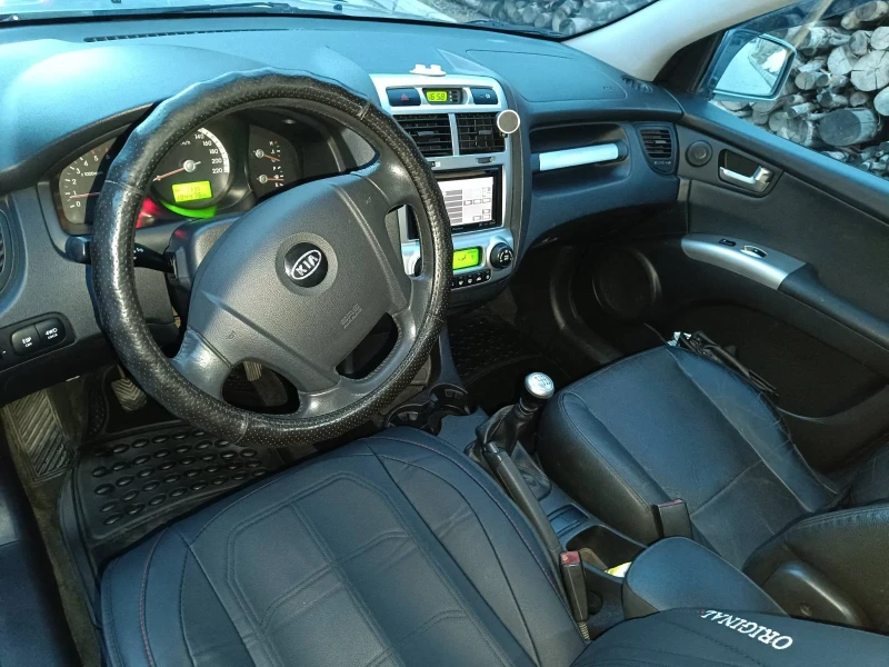 Kia Sportage, снимка 11 - Автомобили и джипове - 47538079