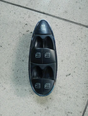 Копчета ел стъкла предни леви Мерцедес Е280 W211