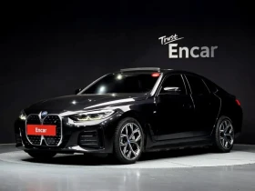 ������ BMW i4