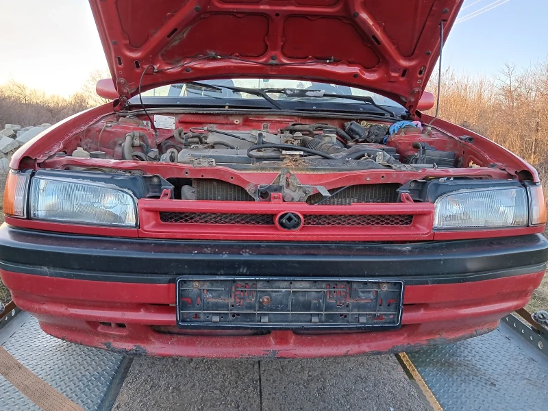 Mazda 323 Може тест, снимка 1 - Автомобили и джипове - 48621818