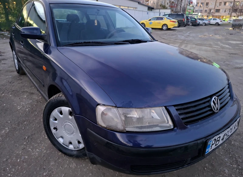 VW Passat 1.6 Газ Клима, снимка 10 - Автомобили и джипове - 53314030