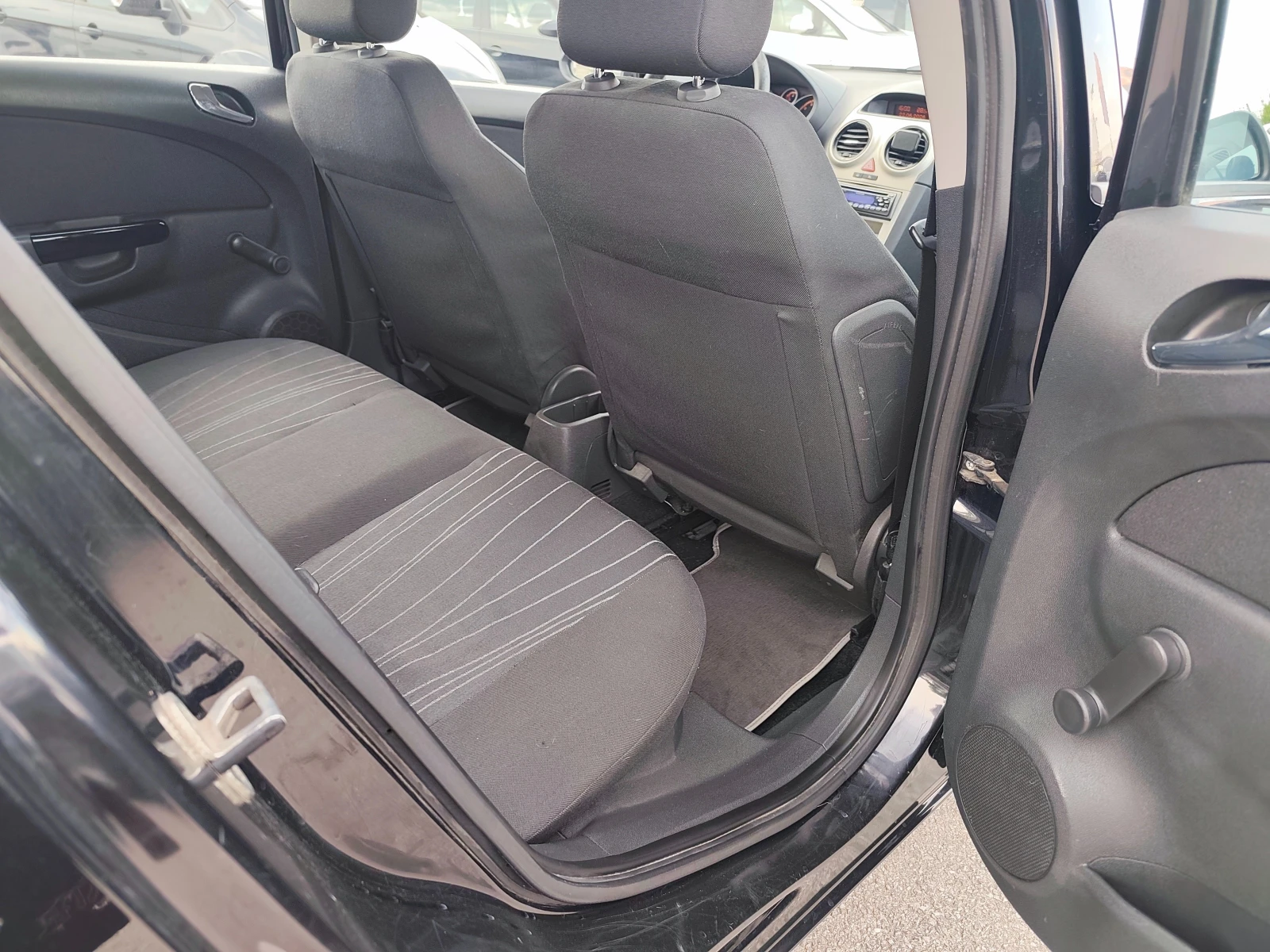 Opel Corsa 1.2i 79000км., снимка 11 - Автомобили и джипове - 55005713