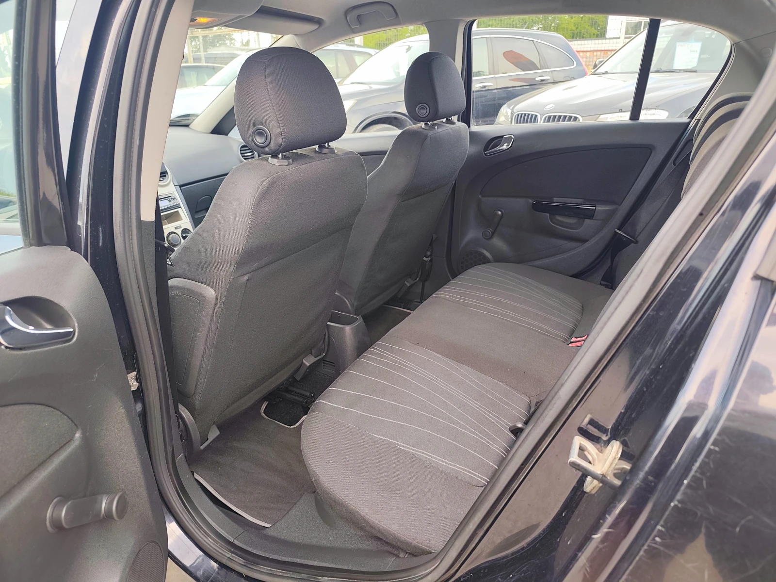 Opel Corsa 1.2i 79000км., снимка 10 - Автомобили и джипове - 55005713